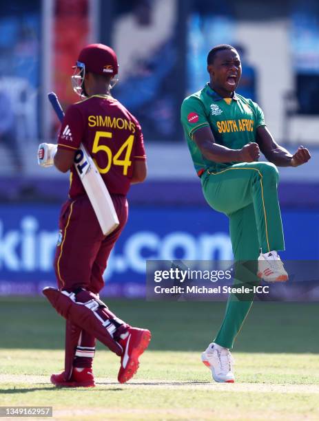 Kagiso Rabada of South Africa celebrates the wicket of Lendl Simmons of West Indies during the ICC Men's T20 World Cup match between South Africa and...