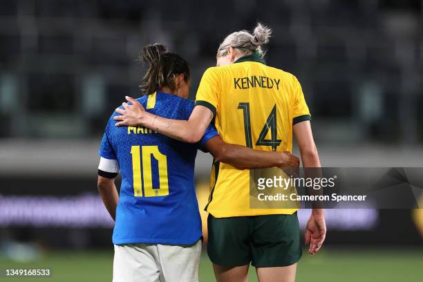 Alanna Kennedy of the Matildas and Marta Vieira Da Silva of Brazil embrace following the Women's International Friendly match between the Australia...
