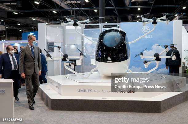 King Felipe VI looks at an exhibition during the inauguration of the World Air Traffic Management Congress at IFEMA, on 26 October, 2021 in Madrid,...