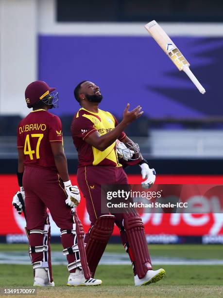 Kieron Pollard of West Indies reacts after being dismissed during the ICC Men's T20 World Cup match between South Africa and West Indies at Dubai...