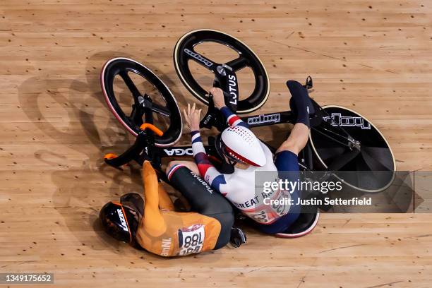 Laurine van Riessen of Team Netherlands and Katy Marchant of Team Great Britain crash during the Women's Keirin quarterfinals - heat 1 of the track...