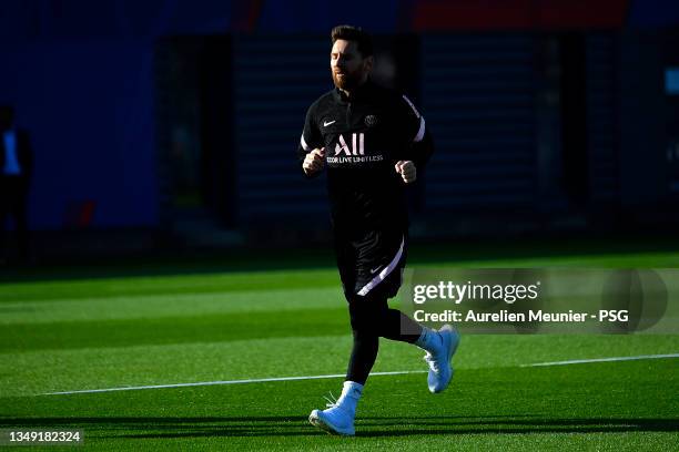 Leo Messi warms up during a Paris Saint-Germain training session at Ooredoo Center on October 26, 2021 in Paris, France.