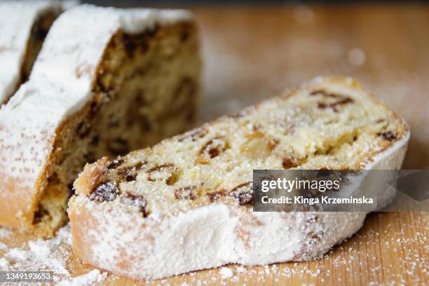 christmas stollen - smelling spices at food market stockfoto's en -beelden