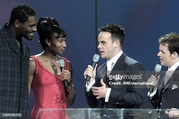 Audley Harrison and Denise Lewis presenters of British Dance Act with Hosts Ant and Dec the the podium during The 21st BRIT Awards 2001 with...