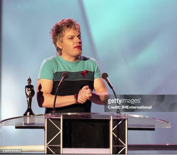 Eddie Izzard presents the International Female Solo Artist award during The BRIT Awards 1997, Monday 24 February 1997, Earls Court Exhibition Centre,...