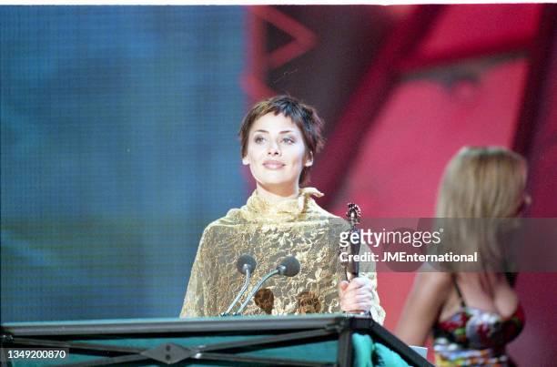 Natalie Imbruglia accepts the award for International Female Solo Artist during The 19th BRIT Awards 1999 with Mastercard, London Arena, London, UK,...