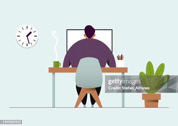 man working behind the desk - man behind computer stock illustrations