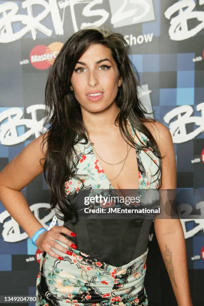 Amy Winehouse attends The 25th BRIT Awards 2005 with Mastercard, Earls Court Exhibition Centre, London, UK, Wednesday 09 February 2005.