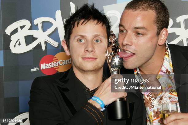 Muse pose with award during The 25th BRIT Awards 2005 with Mastercard, Earls Court Exhibition Centre, London, UK, Wednesday 09 February 2005.