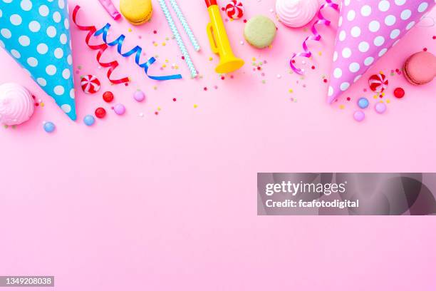 frame of m ulticolored party or birthday accessories - balloon fiesta stock pictures, royalty-free photos & images