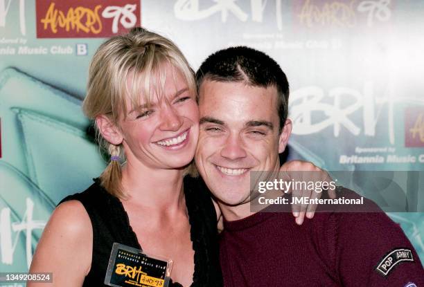 Zoe Ball and Robbie Williams attends The BRIT Awards Nominations Launch 1998, CafÈ De Paris, London, UK, Monday 12 January 1998.