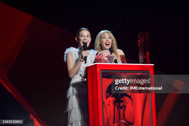 Millie Bobby and Kylie Minogue on stage to present the British Female Solo Artist award during The BRIT Awards 2018 Show, The O2, London, UK,...
