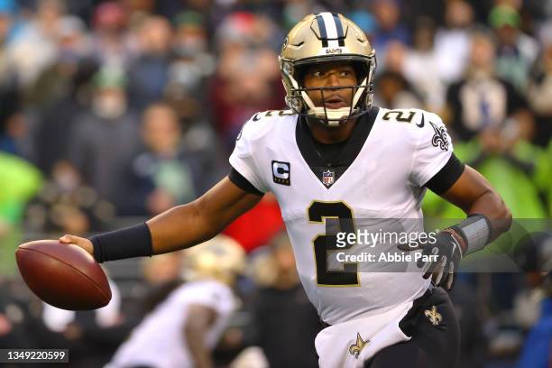 Jameis Winston of the New Orleans Saints looks to throw the ball against the Seattle Seahawks during the first quarter at Lumen Field on October 25,...