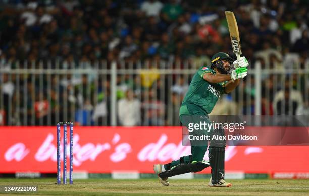 Imad Wasim of Pakistan plays a shot during the ICC Men's T20 World Cup match between Pakistan and New Zealand at Sharjah Cricket Stadium on October...
