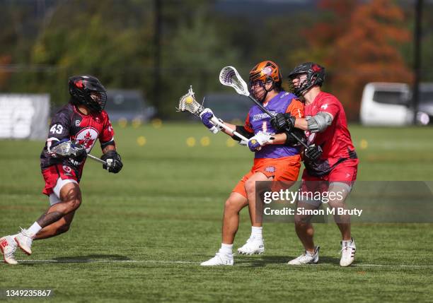 Tehoka Nanticoke of Haudensaunne and Graeme Hossack and Latrell Harris of Canada in action during the game between Canada and Haudensaunne at the...