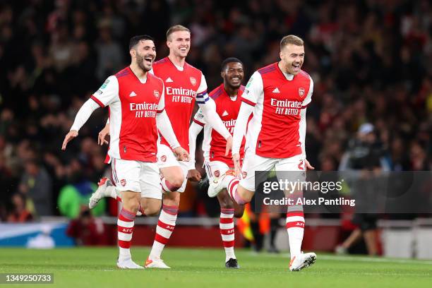 Calum Chambers of Arsenal celebrates with team mates after scoring their side's first goal during the Carabao Cup Round of 16 match between Arsenal...
