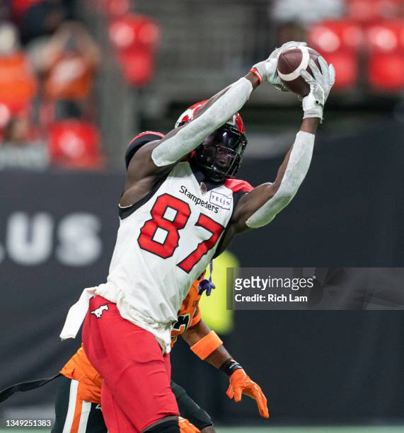 Richie Sindani of the Calgary Stampeders catches a pass during CFL football action at BC Place against the BC Lions on October 16, 2021 in Vancouver,...