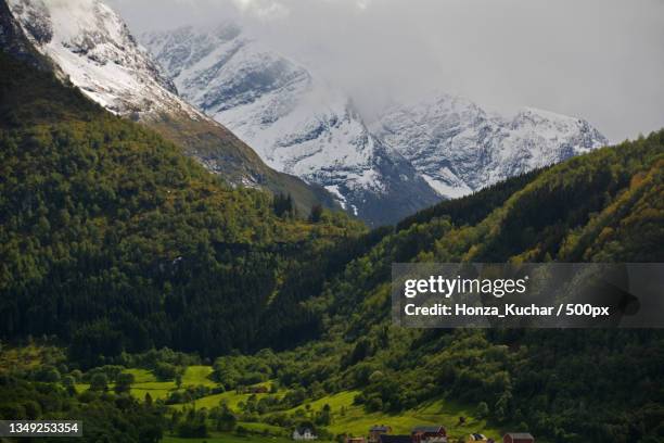 scenic view of snowcapped mountains against sky - kuchar stock pictures, royalty-free photos & images