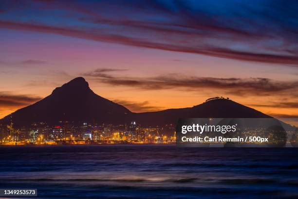 scenic view of sea against sky during sunset,kapstadt,south africa - cape town harbour stockfoto's en -beelden