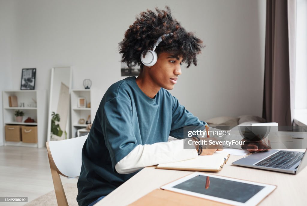 Homework Stack Image Teenager Doing Homework Side View High-Res Stock Photo - Getty Images