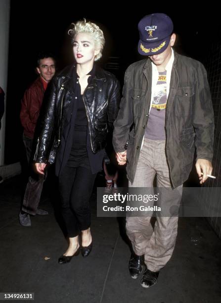Singer Madonna and actor Sean Penn leave the Mitzi E Newhouse at Lincoln Center, New York, New York, August 28, 1986. They had just performed in...