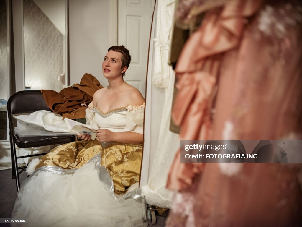 Young Actress in period costume in dressing room