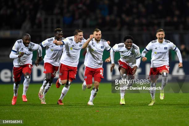 Players of Hamburger SV celebrate their victory in the penalty shootout during the DFB Cup second round match between 1. FC Nuernberg and Hamburger...