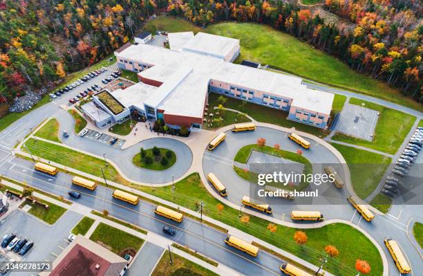 school bus departures - school building stock pictures, royalty-free photos & images