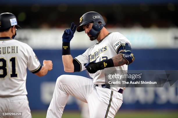 Rangel Ravelo of the Orix Buffaloes celebrates hitting a single in the 3rd inning against Seibu Lions at Kyocera Dome Osaka on October 21, 2021 in...