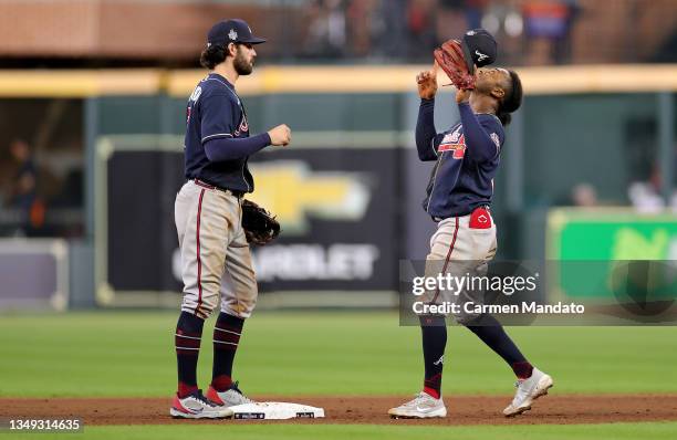 Dansby Swanson and Ozzie Albies of the Atlanta Braves celebrate the teams 6-2 win against the Houston Astros in Game One of the World Series at...