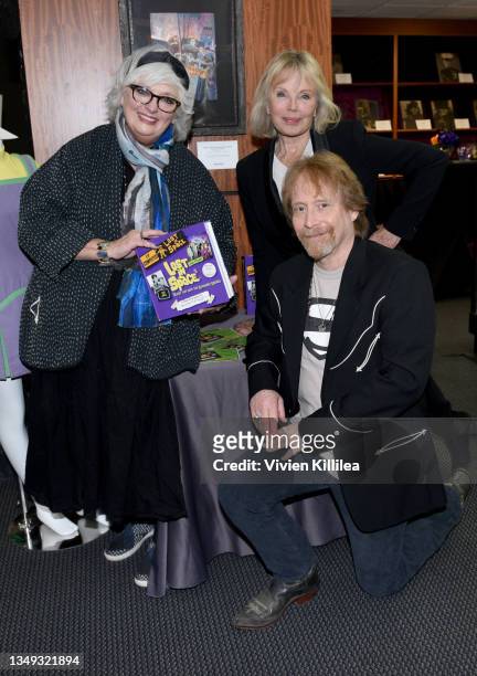 Angela Cartwright, Marta Kristen and Bill Mumy pose with memorabilia from "Lost in Space" at the Auction Reception and Preview: Monsters & Friends:...