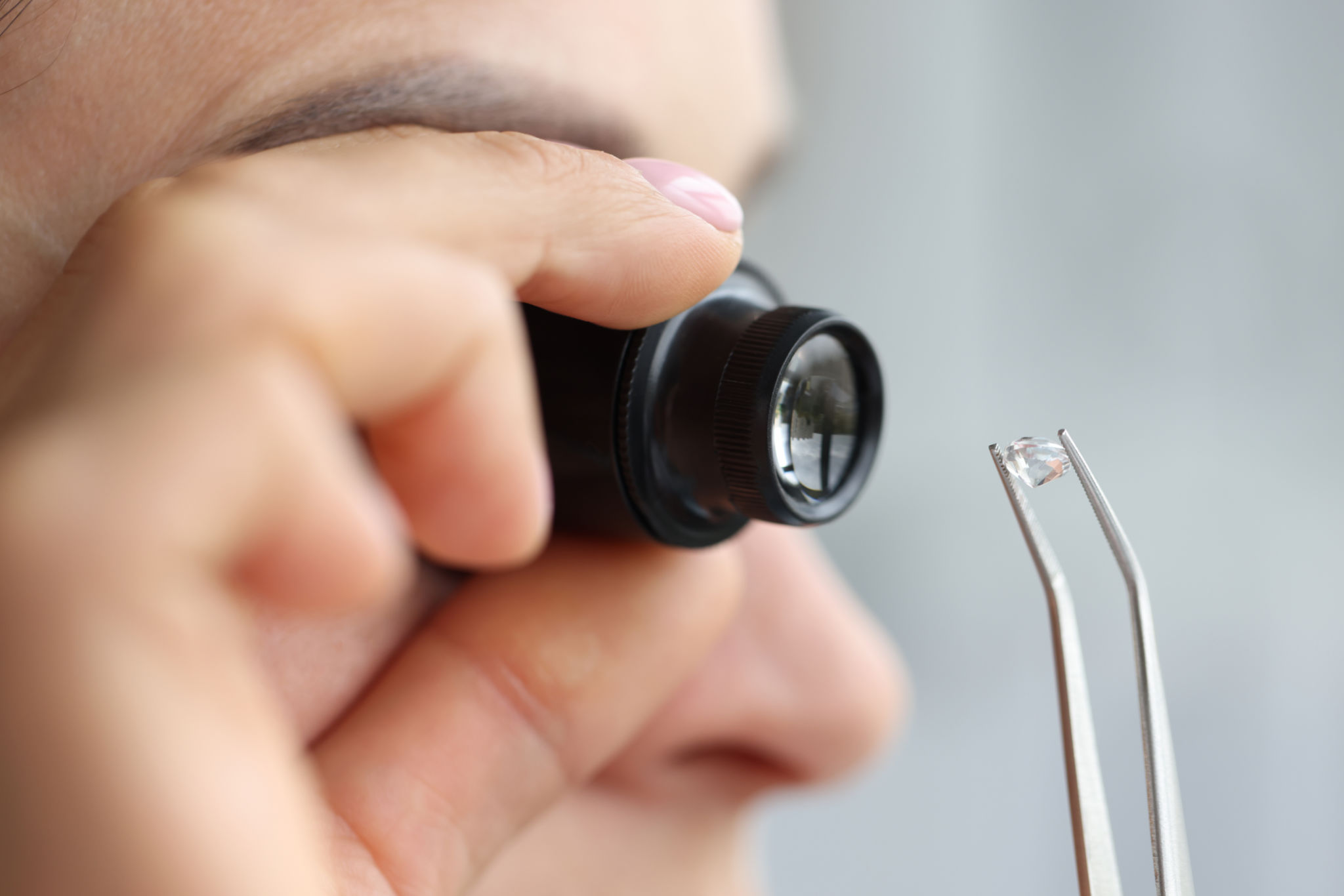 gemologist examining