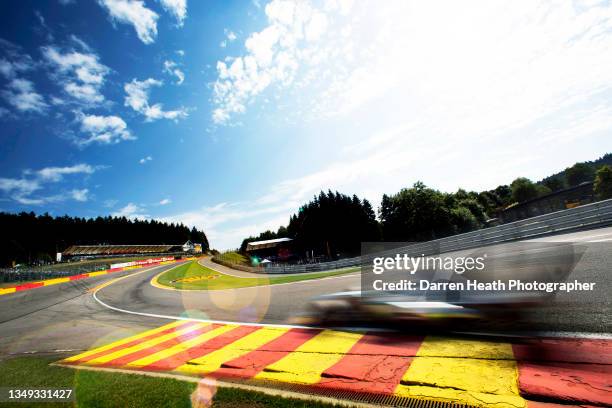 British Mercedes AMG Formula One team racing driver Lewis Hamilton driving his F1 W04 racing car at speed through the Eau Rouge corner and over the...