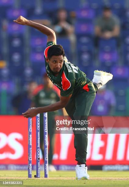 Mustafizur Rahman of Bangladesh in bowling action during the ICC Men's T20 World Cup match between England and Bangladesh at Sheikh Zayed stadium on...
