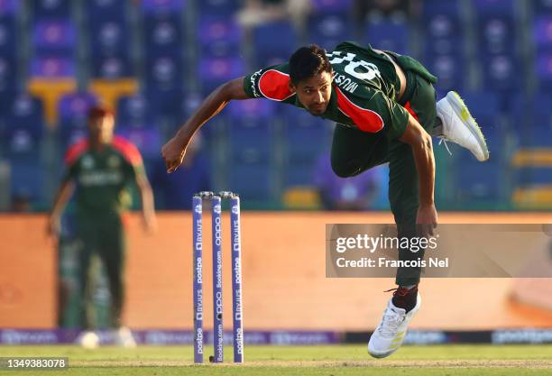 Mustafizur Rahman of Bangladesh in bowling action during the ICC Men's T20 World Cup match between England and Bangladesh at Sheikh Zayed stadium on...