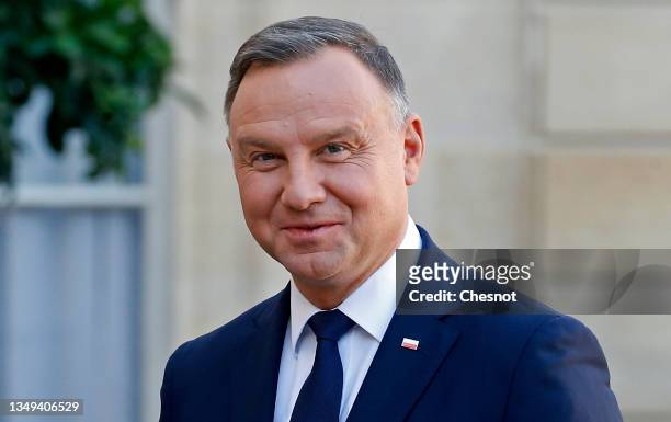 Polish President Andrzej Duda poses as he arrives for a working lunch with French President Emmanuel Macron at the Elysee Palace on October 27, 2021...