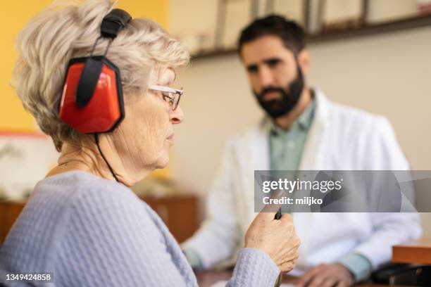 hearing test and buying hearing aid - old amplifier stock pictures, royalty-free photos & images