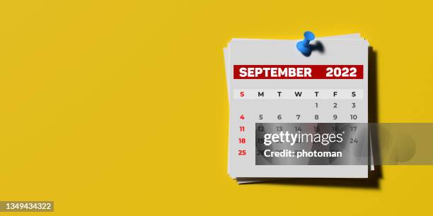 september 2022 pin-up calendar page on yellow background with copy space. - september stock pictures, royalty-free photos & images