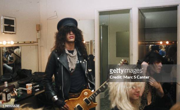 Slash, Steven Adler and Izzy Stradlin of the rock group 'Guns n' Roses' backstage before a sold out show at the Roxy Theatre on January 18, 1986 in...