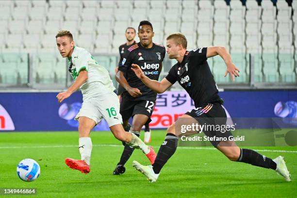 Davide Frattesi of US Sassuolo Calcio kick on goal during the Serie A match between Juventus and US Sassuolo at Allianz Stadium on October 27, 2021...