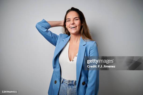 smiling female entrepreneur on white background - woman jacket stock pictures, royalty-free photos & images