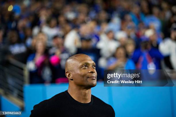 Former running back Eddie George of the Tennessee Titans watching the game from the sidelines during a game against the Buffalo Bills at Nissan...