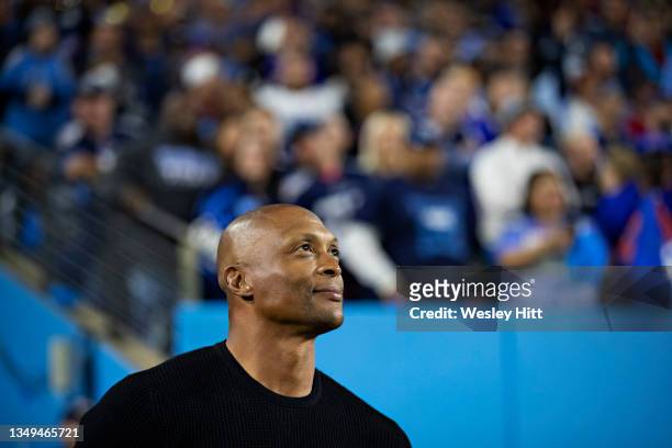 Former running back Eddie George of the Tennessee Titans watching the game from the sidelines during a game against the Buffalo Bills at Nissan...