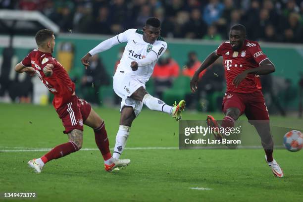 Breel Embolo of Borussia Moenchengladbach scores their side's fourth goal during the DFB Cup second round match between Borussia Mönchengladbach and...