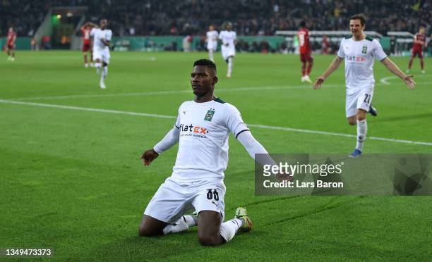 Breel Embolo of Borussia Moenchengladbach celebrates after scoring their team's fourth goal during the DFB Cup second round match between Borussia...