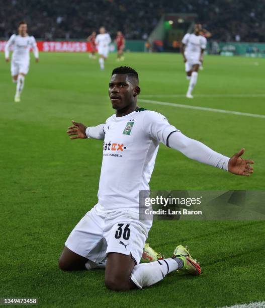 Breel Embolo of Borussia Moenchengladbach celebrates after scoring their team's fourth goal during the DFB Cup second round match between Borussia...