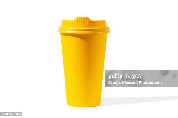 yellow coffee cup isolated on white background - vaso de café de papel fotografías e imágenes de stock