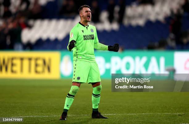 Martin Hansen, goalkeeper of Hannover 96 celebrates victory after the DFB Cup second round match between Hannover 96 and Fortuna Düsseldorf at...