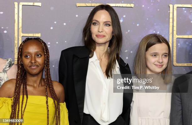 Zahara Jolie-Pitt, Angelina Jolie and Vivienne Jolie-Pitt attend the "Eternals" UK Premiere at the BFI IMAX Waterloo on October 27, 2021 in London,...