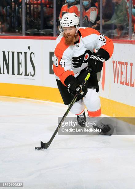 Ryan Ellis of the Philadelphia Flyers skates the puck against the Boston Bruins at the Wells Fargo Center on October 20, 2021 in Philadelphia,...